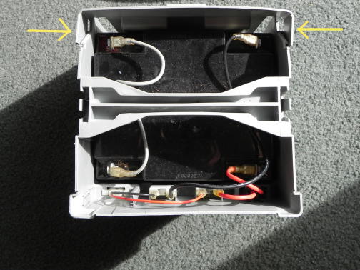 Hinged front of the battery pack
